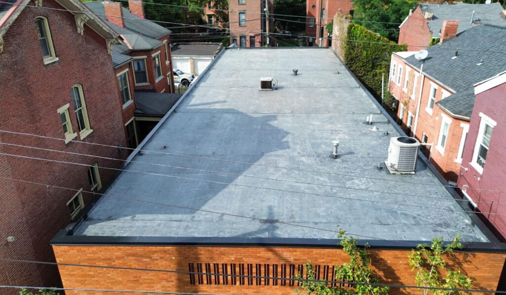 Commercial roof warranty overview and system coverage on flat rooftop.