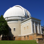 Image of a historic observatory building with a prominent dome, surrounded by green grass and trees, symbolizing the importance of structure maintenance and inspections for homeowners in Point Breeze.