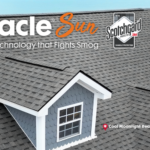 Pinnacle® Sun shingles showcasing innovative smog-fighting technology, gray roof with architectural details and window, emphasizing energy efficiency and modern roofing solutions.