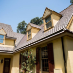 Roof with stylish shingles, showcasing roof flashing and architectural details, enhancing home aesthetics and energy efficiency.