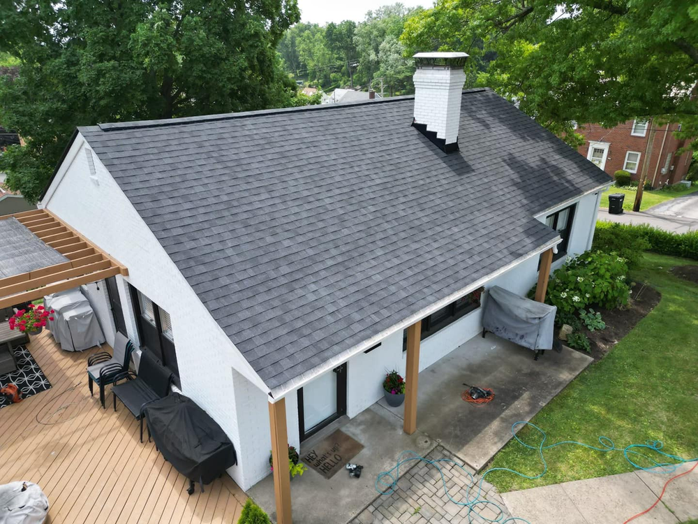 Atlas Pinnacle® Pristine architectural shingles in the captivating Black Shadow color offer a stunning and sophisticated look