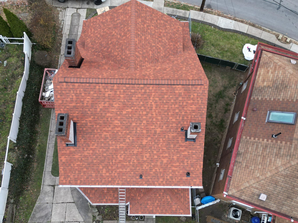 Owens Corning TruDefinition Duration Terra Cotta Shingles with Malick Brothers Exteriors.