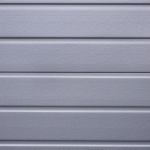 Gray siding panels illustrating exterior home maintenance for Plum Borough residents.
