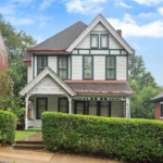 Victorian-style house in Sheraden with well-maintained landscaping, emphasizing the importance of home protection during winter months.