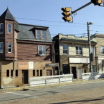 Edgewood residential buildings with varied architectural styles, showcasing home exteriors in need of maintenance, emphasizing the importance of roofing and siding upkeep.