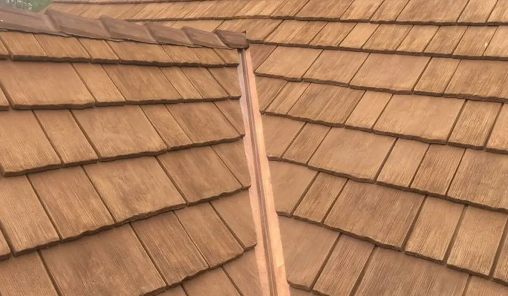 Wood shake roofing materials showcasing a close-up view of textured shingles, emphasizing domestic sourcing and quality for roofing projects.