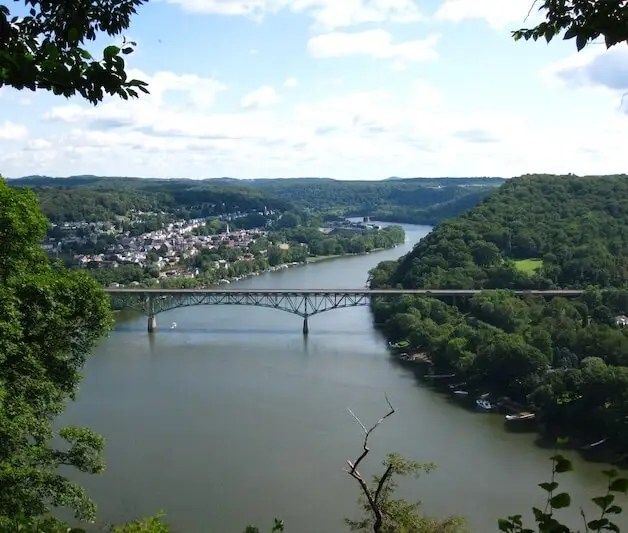 The Freeport Bridge spanning the Allegheny River near Cheswick, Pennsylvania. Featured on Malick Brothers Exteriors' Cheswick service area page, this image highlights a key local landmark in the area where we provide expert roof repair, roof replacement, and roofing services.