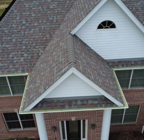 Newly installed asphalt shingle roof on a Pittsburgh home, showcasing durability and curb appeal, with a focus on energy efficiency and local climate considerations.