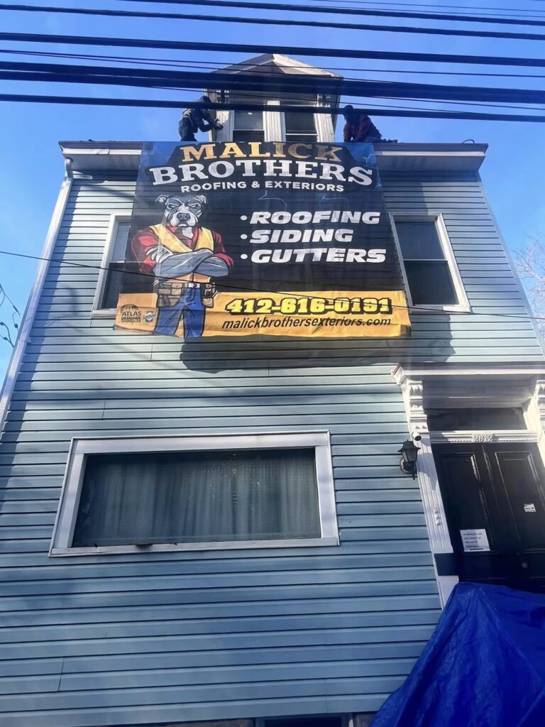 Malick Brothers Exteriors LLC company logo representing roofing and siding services in Pittsburgh, Pennsylvania.