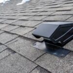 Roof ventilation system on asphalt shingles, emphasizing roofing maintenance and energy efficiency for homeowners in Pittsburgh.