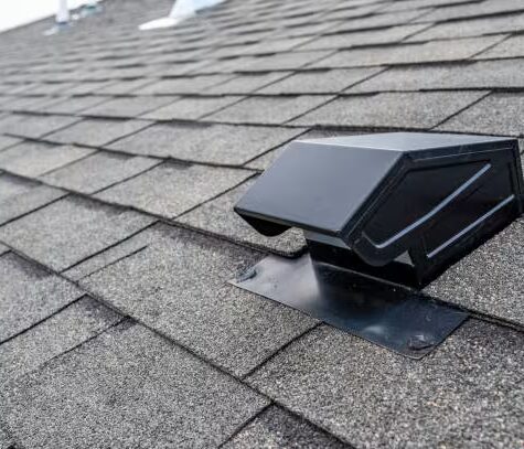Roof ventilation system installed on asphalt shingles, enhancing energy efficiency and lifespan of roofs in Pittsburgh homes.