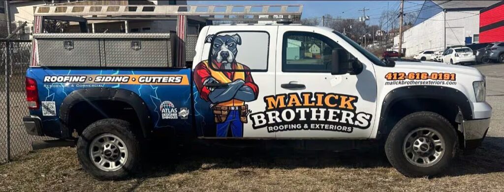 Malick Brothers Exteriors truck featuring a cartoon dog mascot, showcasing roofing, siding, and gutters services, parked in a commercial area.