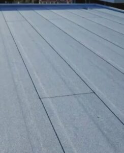 Rubber roofing surface on a flat roof, showcasing durability and low maintenance, relevant to Pittsburgh's climate and the services of Malick Brothers Exteriors.
