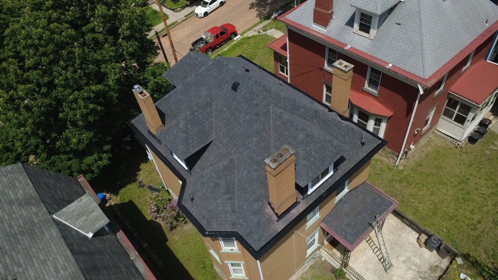 Black Shadow roof and coated box gutters by Malick Brothers Exteriors in Bellevue