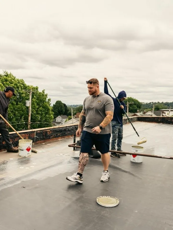 Malick Brothers crew installing a commercial flat roof in Pittsburgh