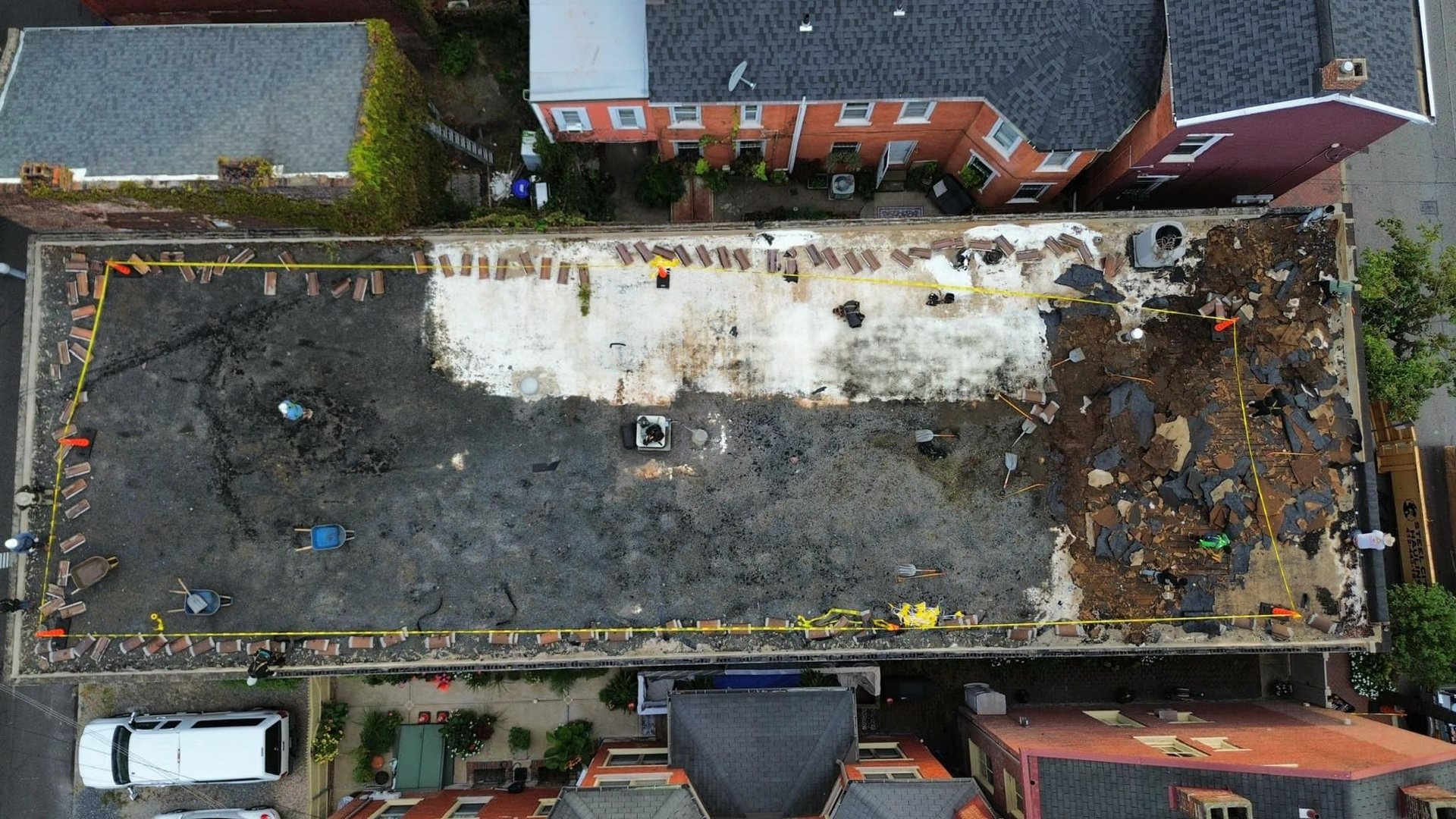 Flat roof tear off in progress by Malick Brothers Exteriors in the Pittsburgh area