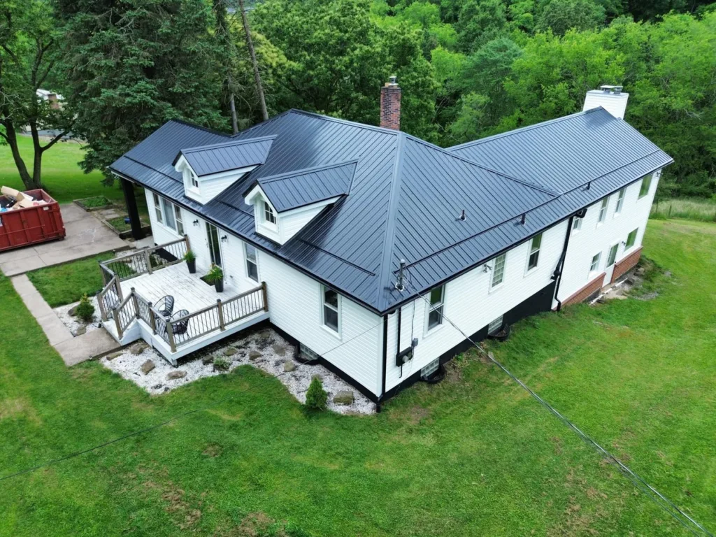 Aerial view of a dark metal roof installed by Malick Brothers Exteriors in Wexford