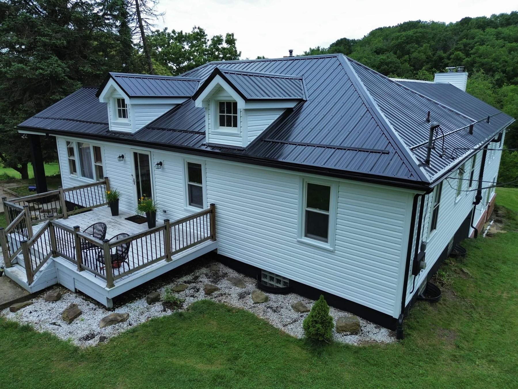 Metal roof panels and dormers on a Wexford home roofed by Malick Brothers Exteriors