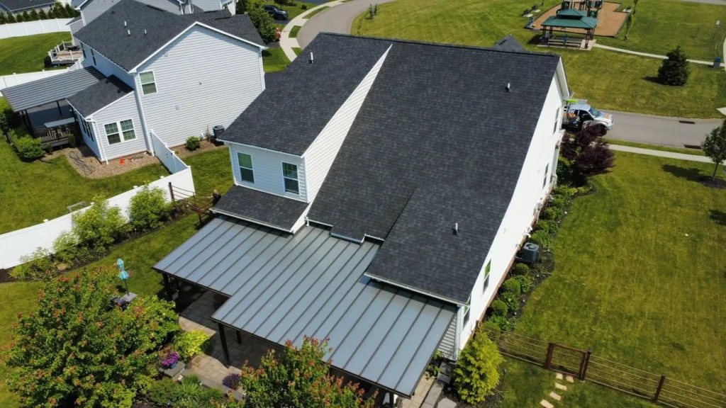 Standing seam metal patio roof installed by Malick Brothers Exteriors