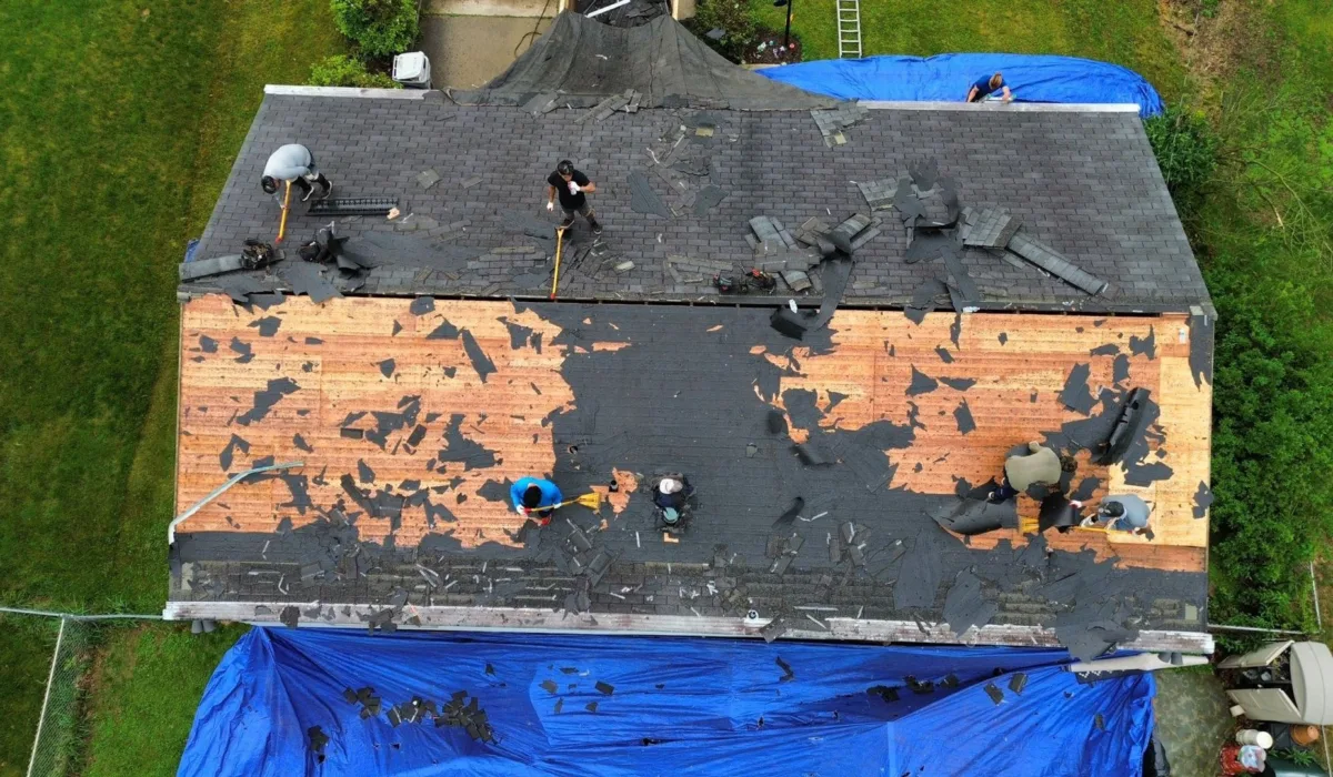 Malick Brothers crew replacing a roof in Allison Park