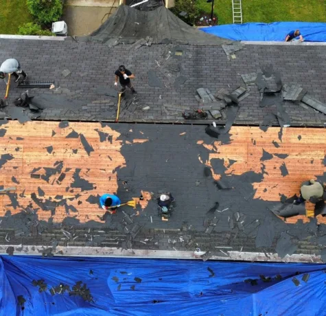 Malick Brothers crew replacing a roof in Allison Park