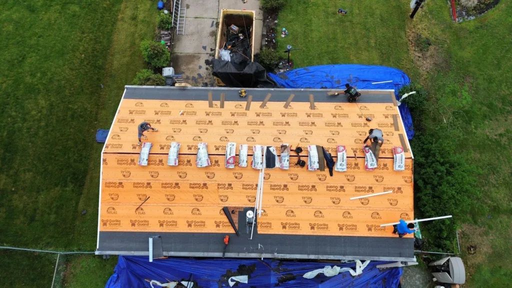 Malick Brothers crew replacing a roof in Allison Park