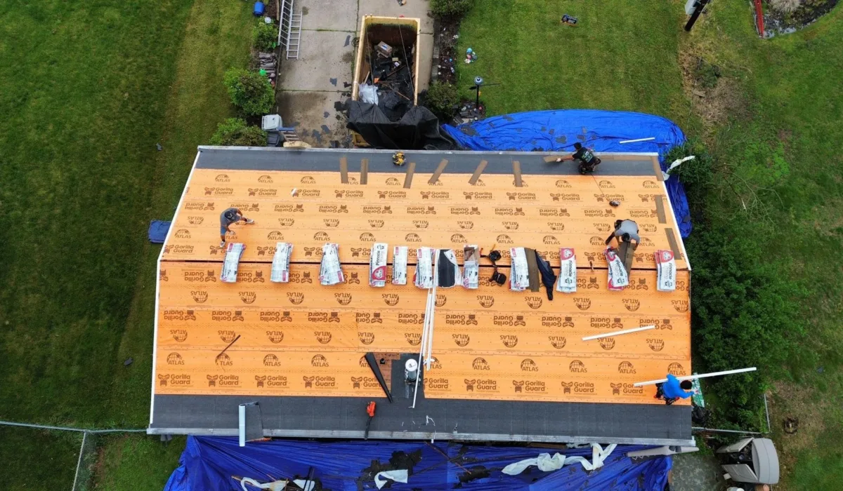 Malick Brothers crew replacing a roof in Allison Park
