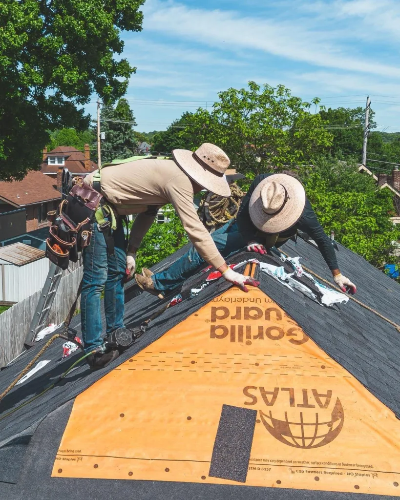 Malick Brothers crew replacing a roof in the Pittsburgh area