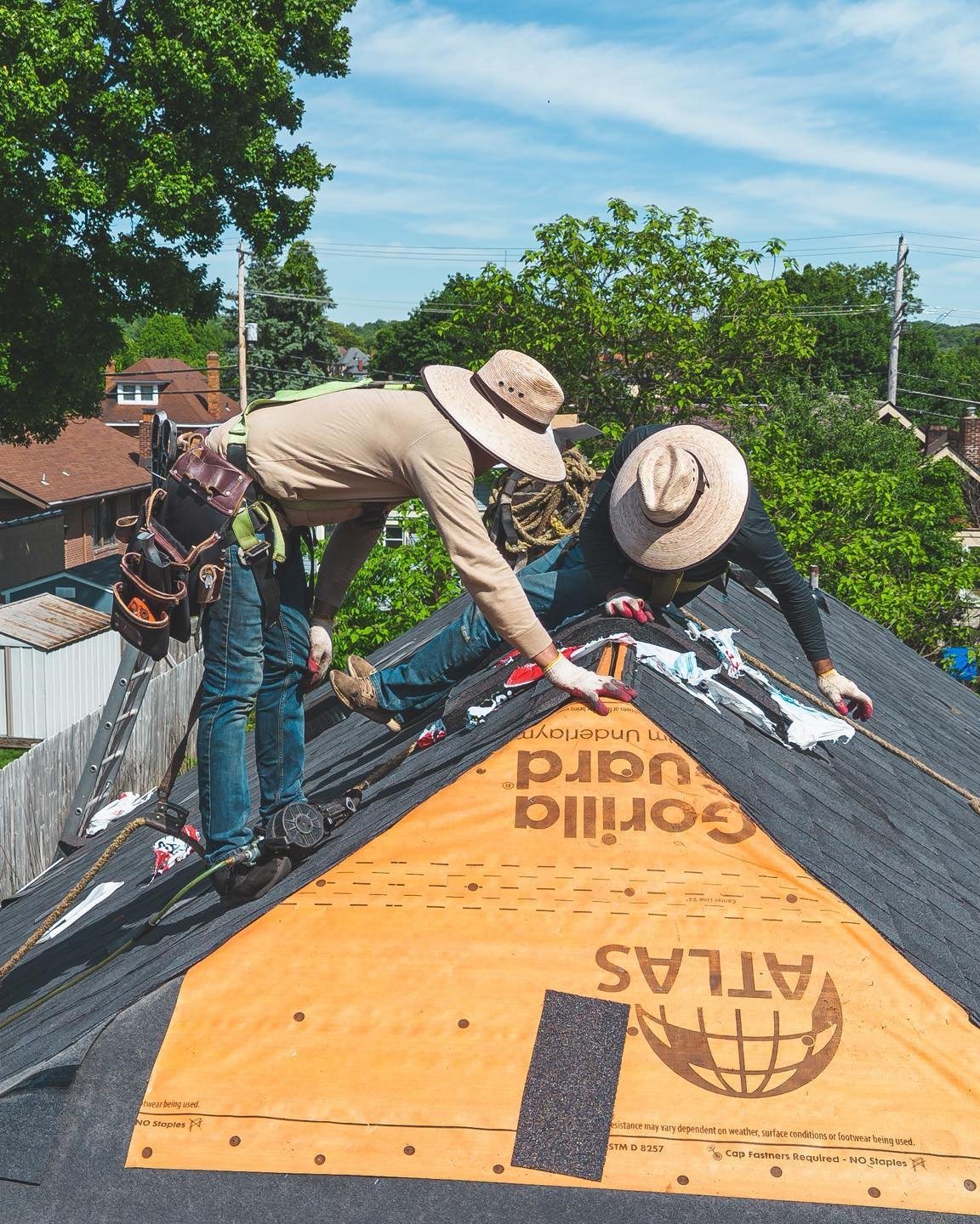 Malick Brothers crew replacing a roof in the Pittsburgh area