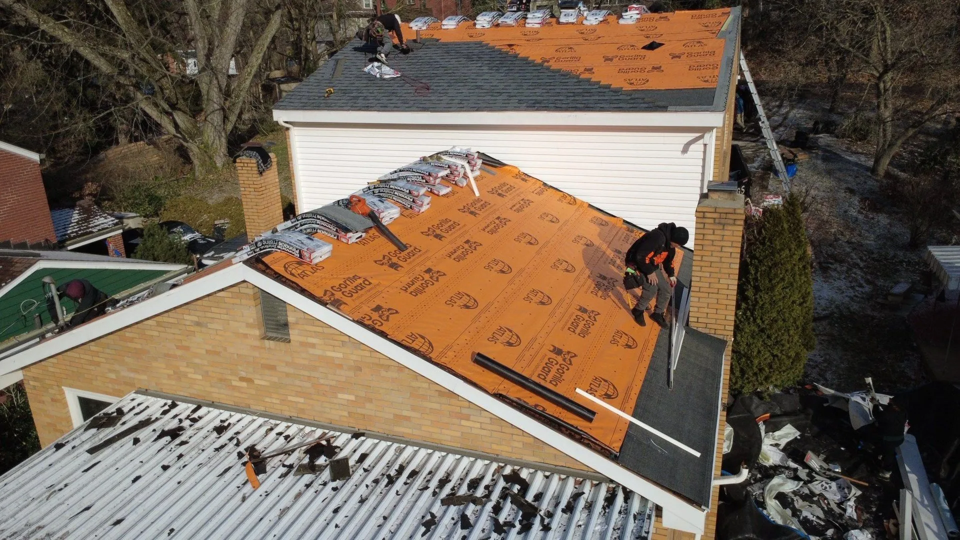 Malick Brothers crew replacing a roof in the Pittsburgh area