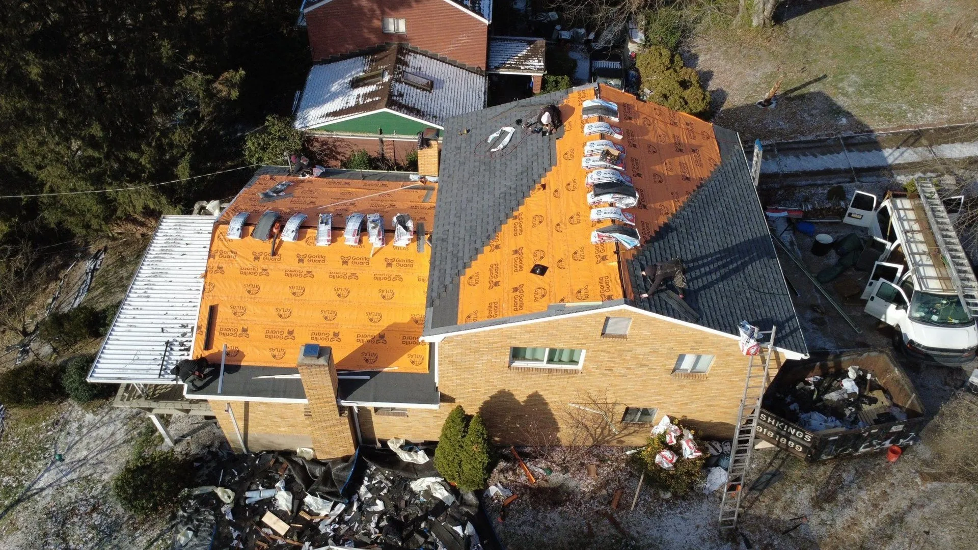 Malick Brothers crew replacing a roof in the Pittsburgh area