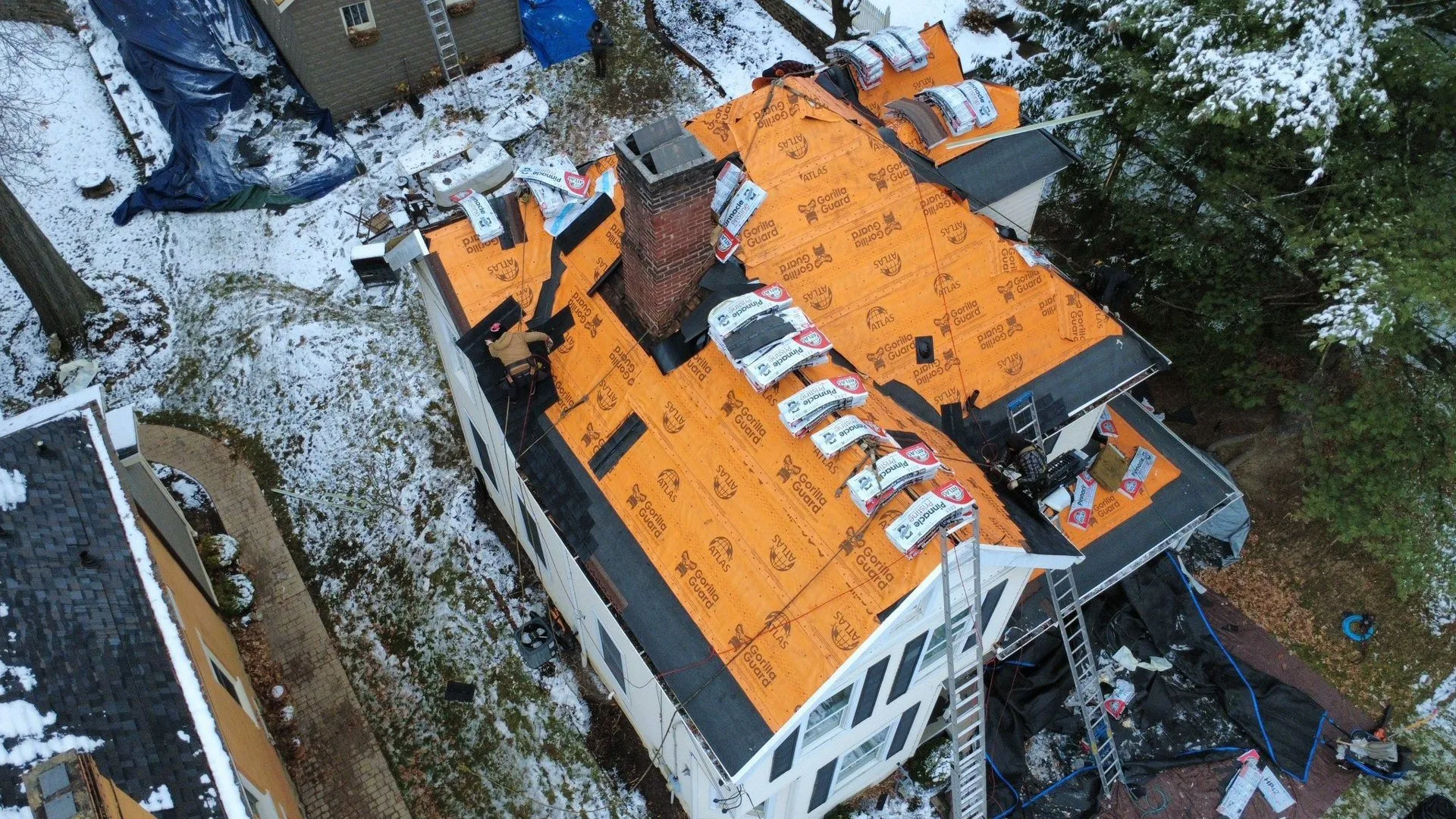 Malick Brothers crew replacing a roof in the Pittsburgh area