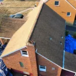 Malick Brothers crew working on a roof in the Pittsburgh area