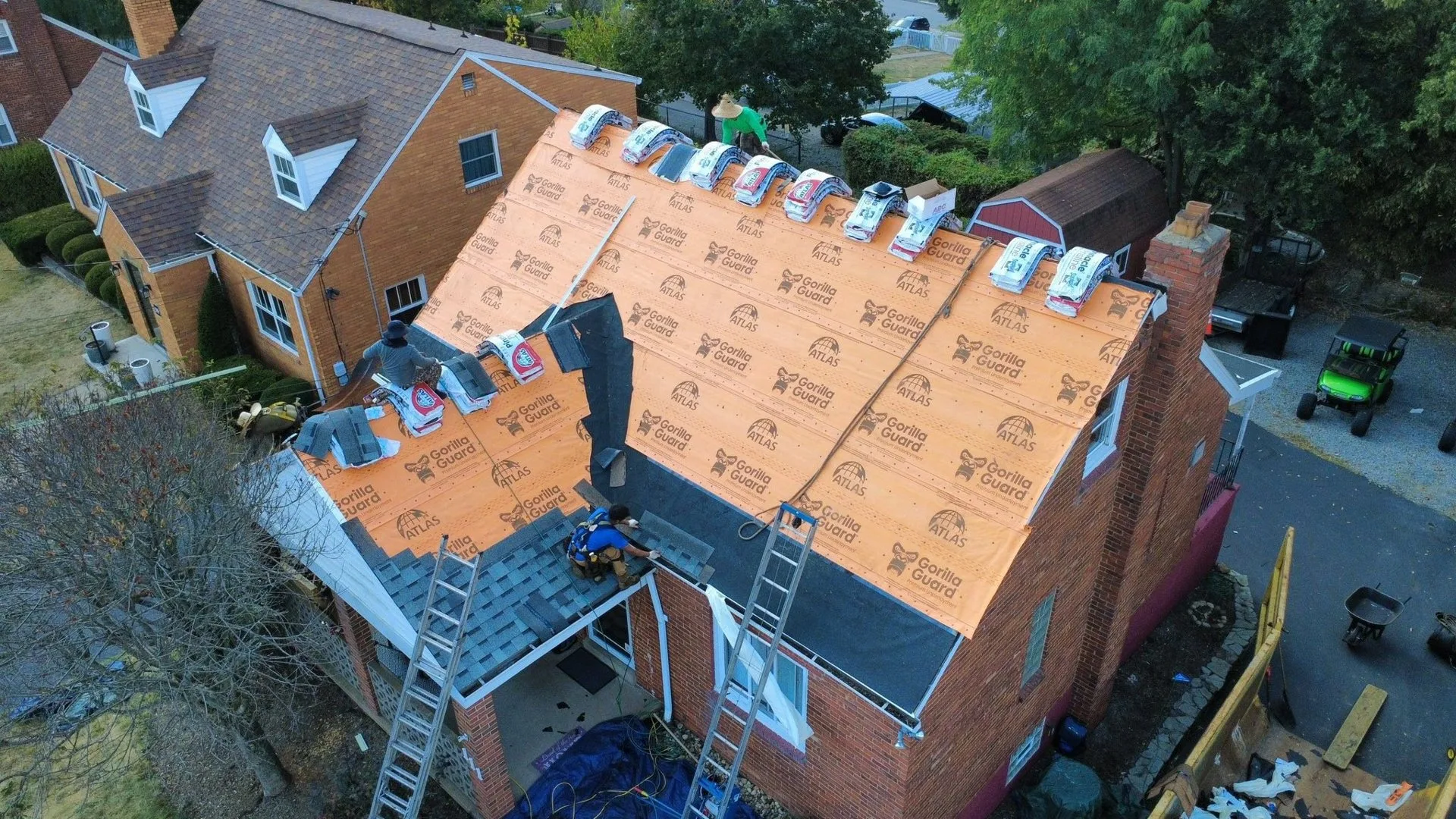 Malick Brothers crew working on a roof in the Pittsburgh area