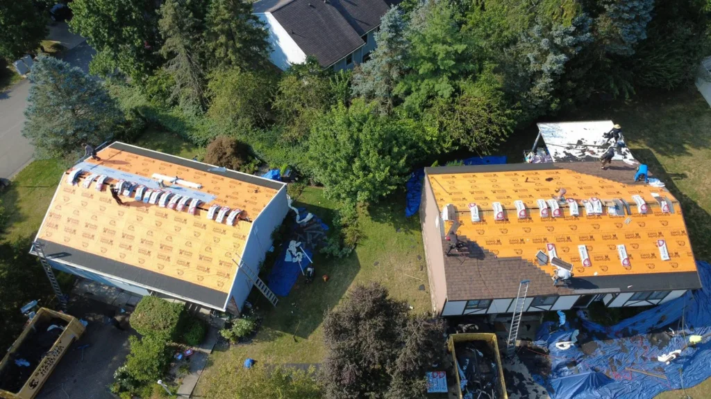 Malick Brothers crew working on a roof in the Pittsburgh area
