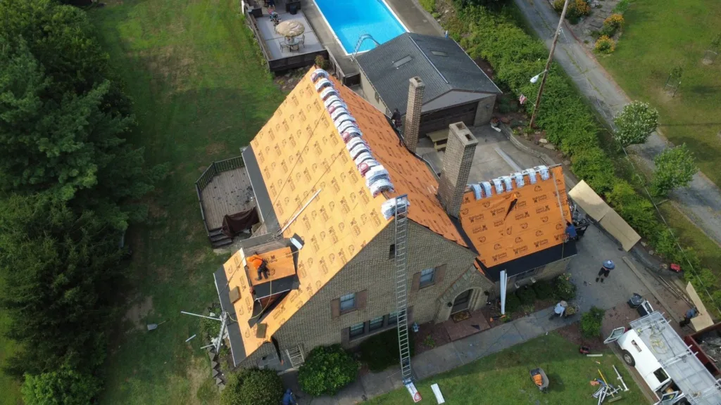 Malick Brothers crew working on a roof in the Pittsburgh area