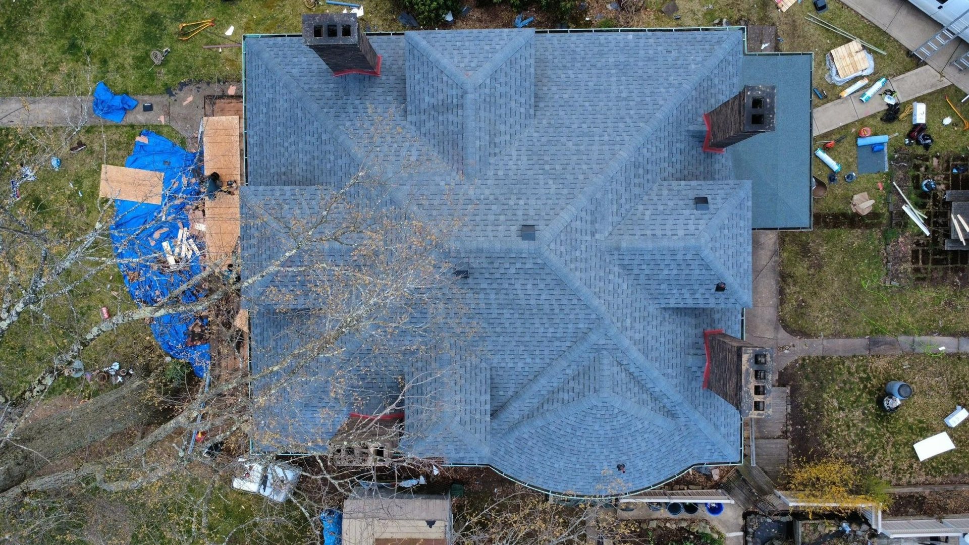 Malick Brothers crew working on a roof in the Pittsburgh area