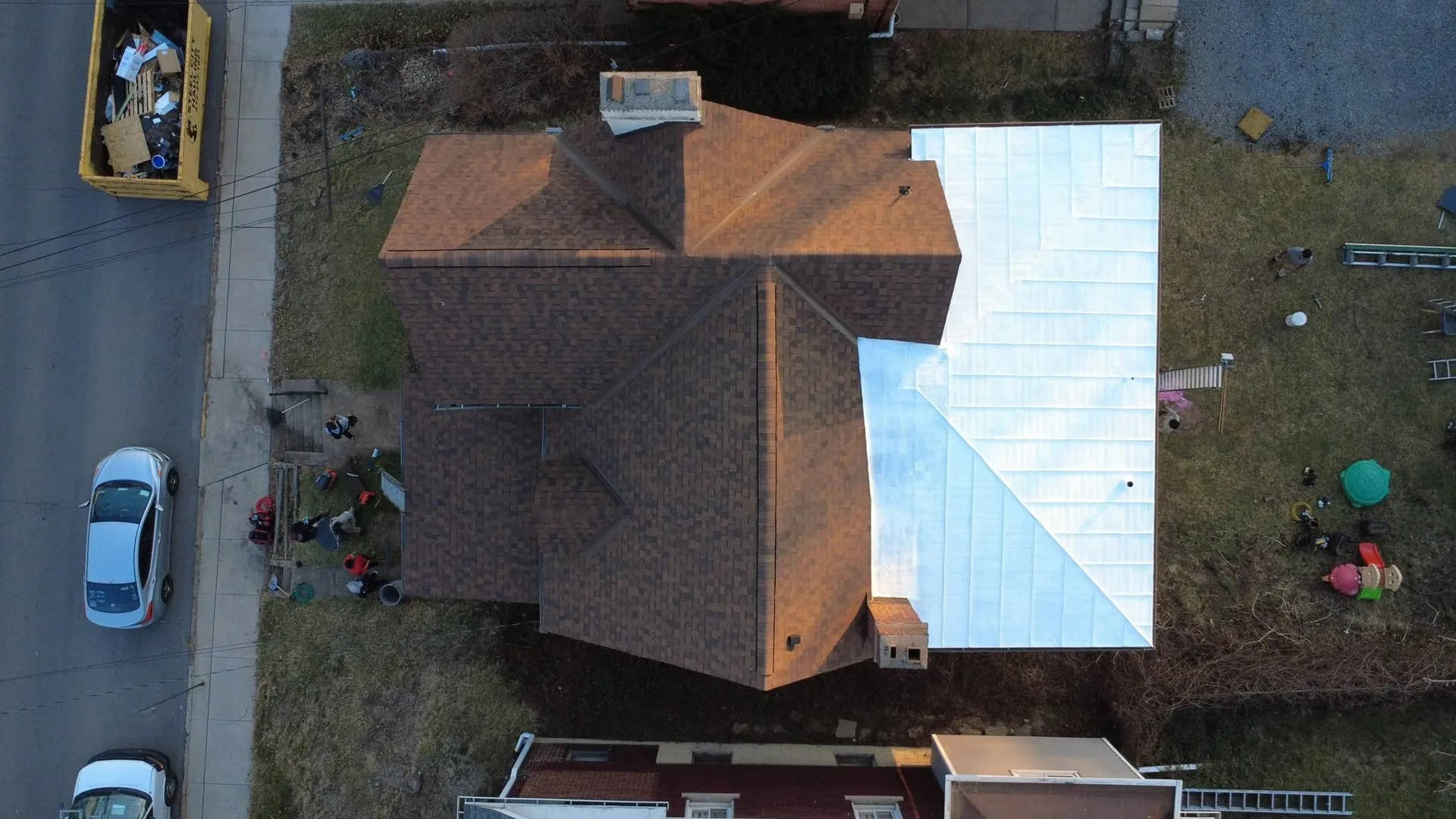 Malick Brothers crew working on a roof in the Pittsburgh area