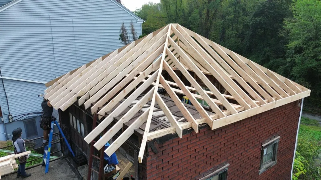 Malick Brothers crew working on a roof in the Pittsburgh area
