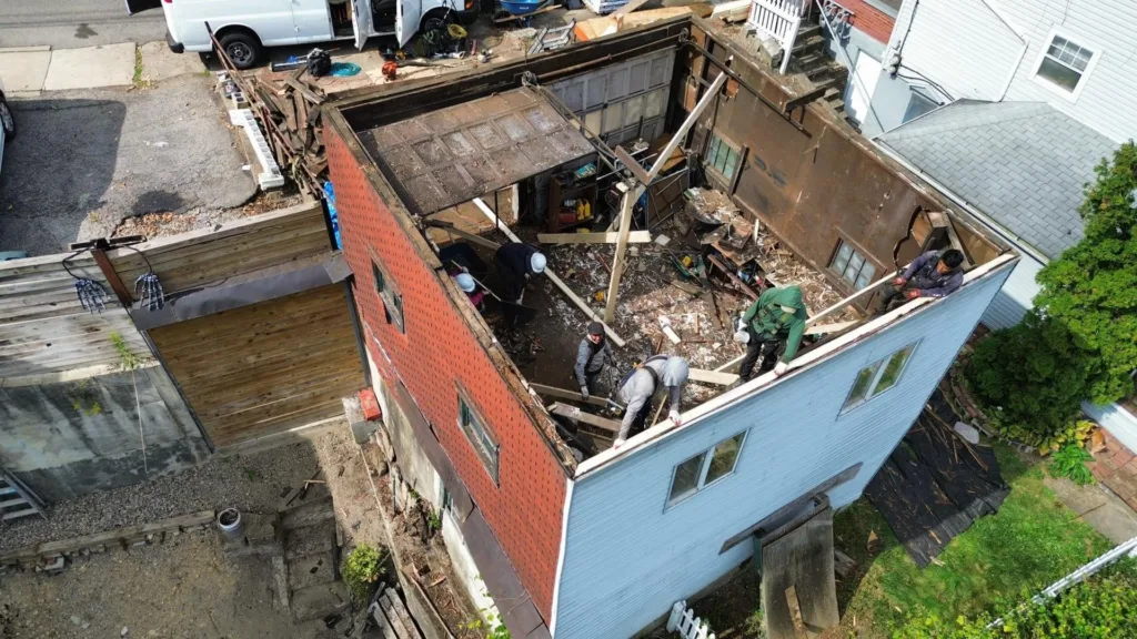 Malick Brothers crew working on a roof in the Pittsburgh area