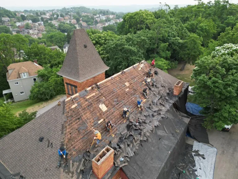 Malick Brothers crew working on a roof in the Pittsburgh area