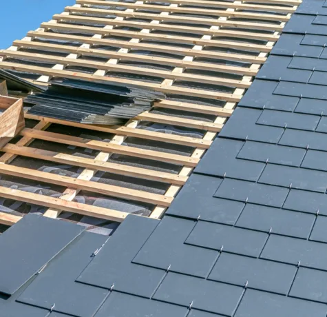 New natural slate going onto a roof